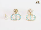 Pearl and aqua blue enamel CD bombers