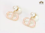 Pearl and baby pink enamel CD bombers