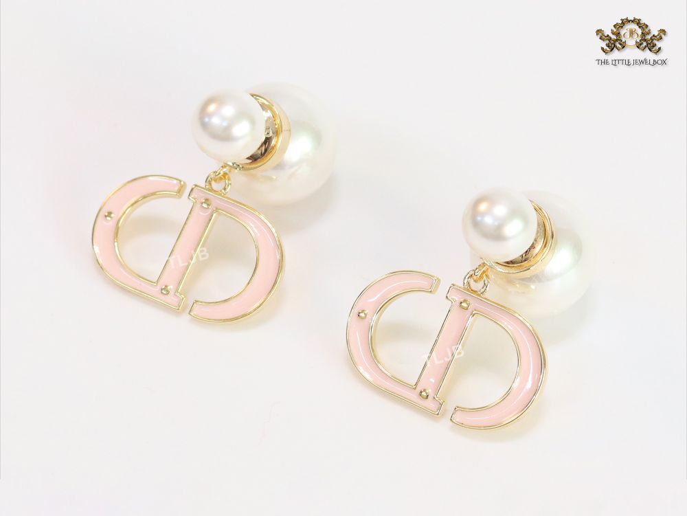 Pearl and baby pink enamel CD bombers