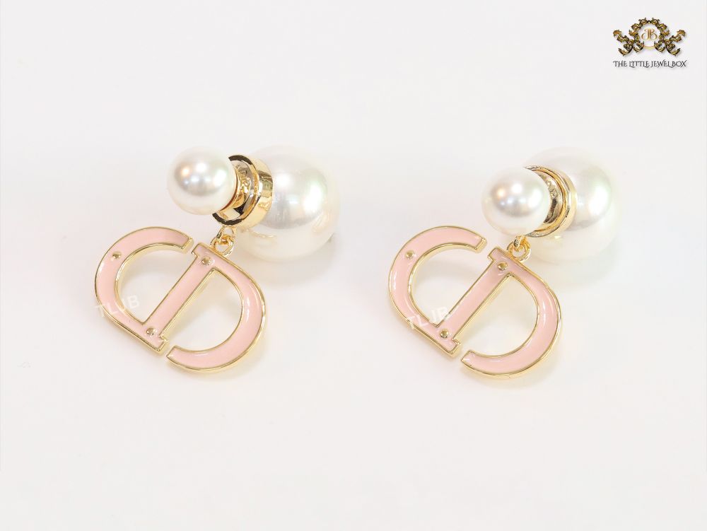 Pearl and baby pink enamel CD bombers
