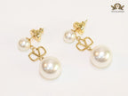 Double pearl and alphabet V dangles