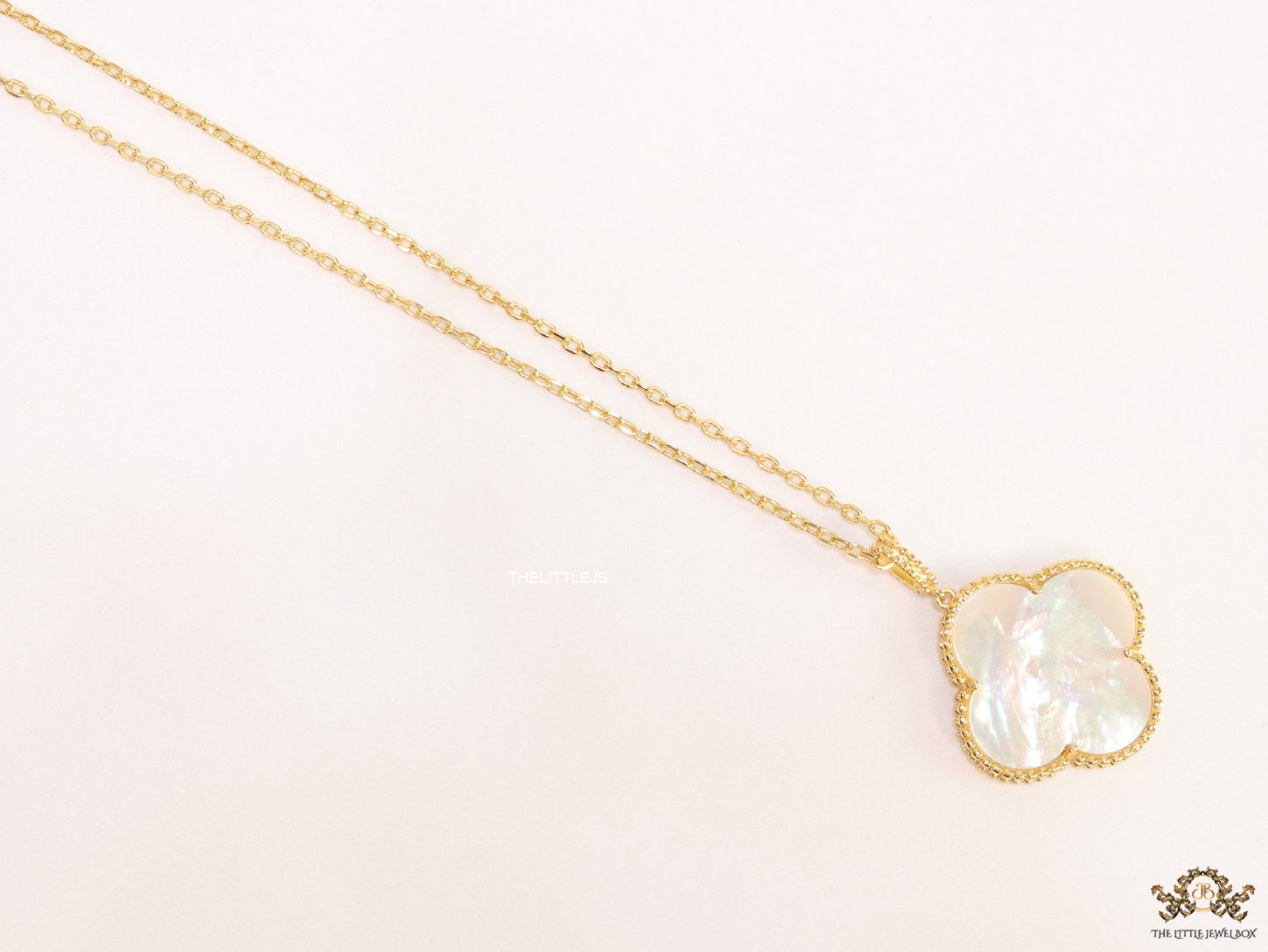 MOP clover pendant in gold plated chain