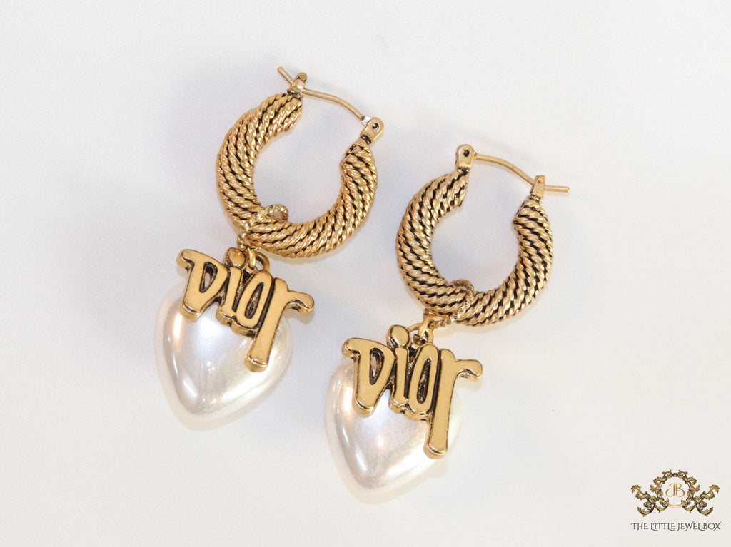 Golden hoops with alphabets and pearl drop