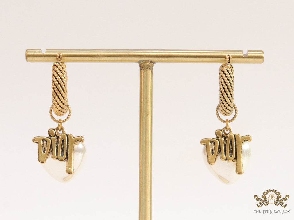 Golden hoops with alphabets and pearl drop