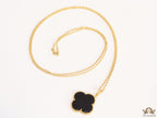Black enamel clover pendant in gold plated chain