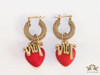 Golden hoops with alphabets and red pearl drop