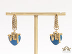 Golden hoops with alphabets and blue pearl drop
