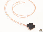 Black enamel clover pendant in rose gold plated chain