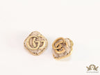 Cream velvet fur studs with golden twin G motif