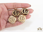 Cream velvet fur studs with golden twin G motif