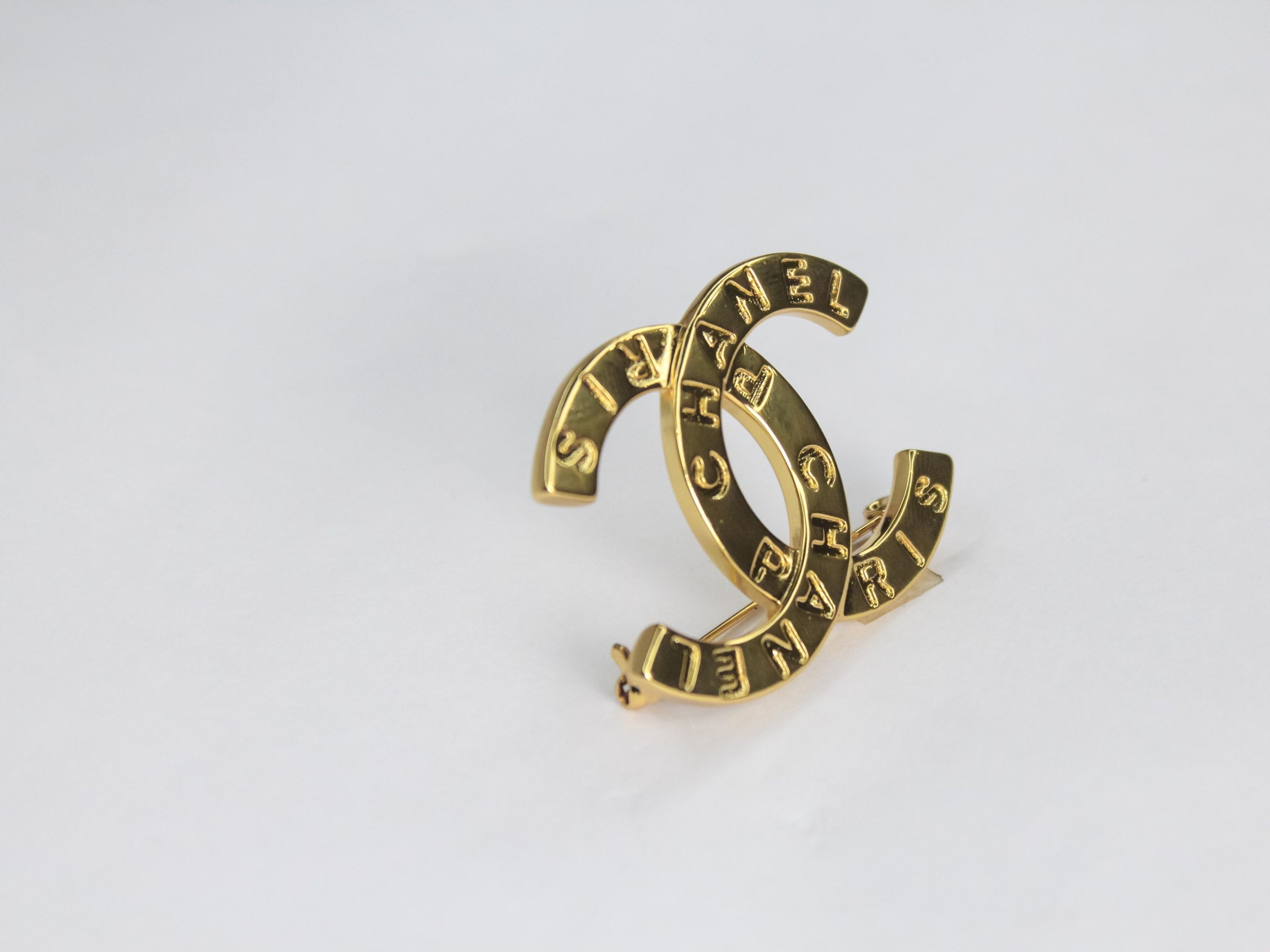 Double C Matt gold brooch
