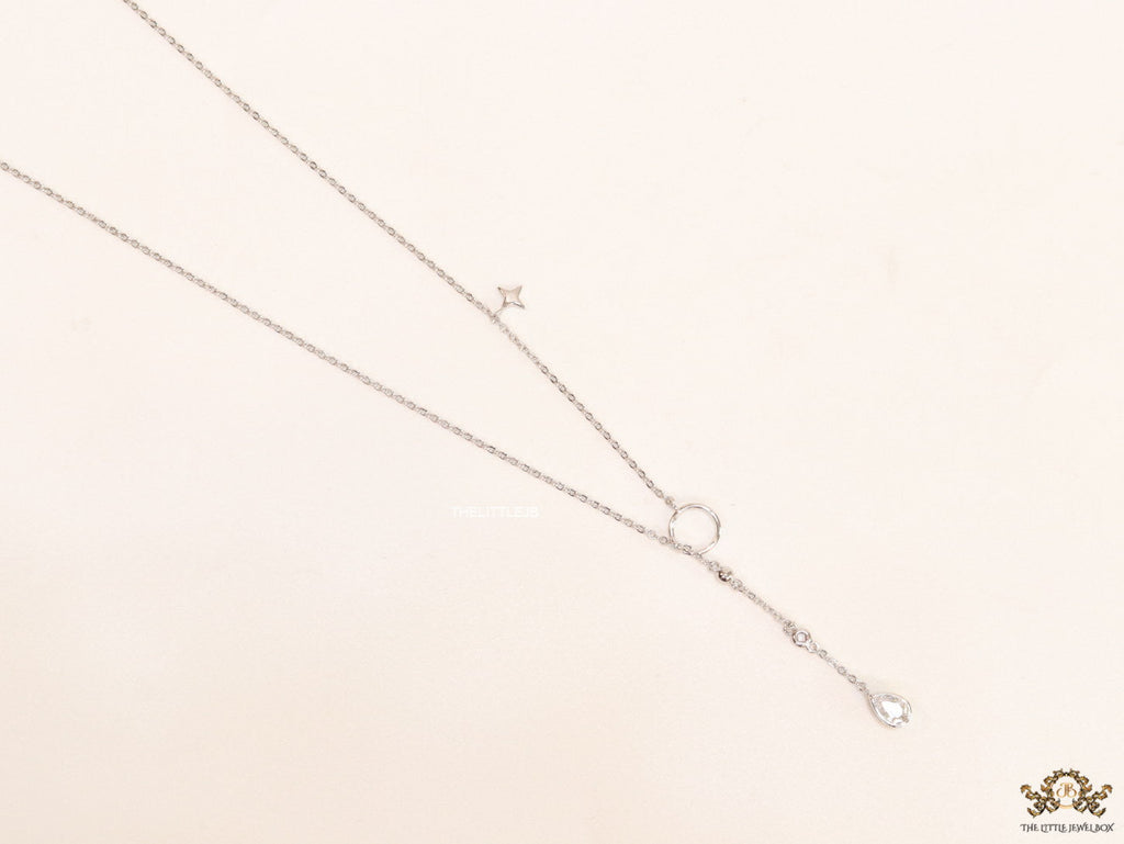 Platinum knot necklace with cz drop and small charms