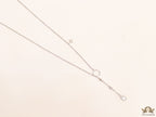 Platinum knot necklace with cz drop and small charms