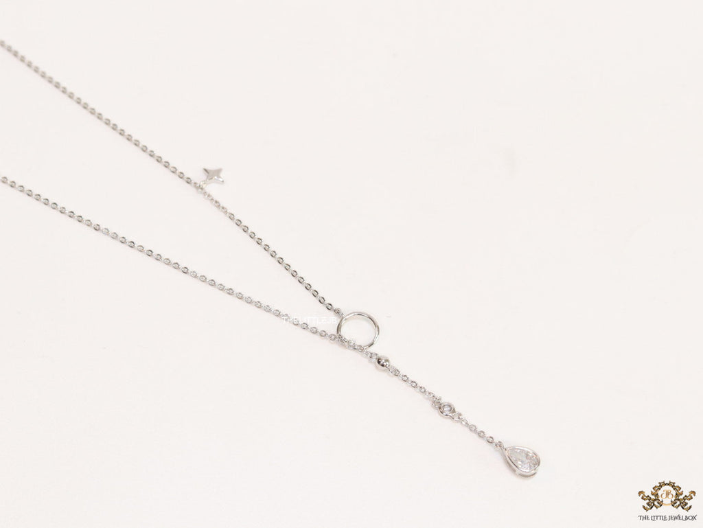 Platinum knot necklace with cz drop and small charms