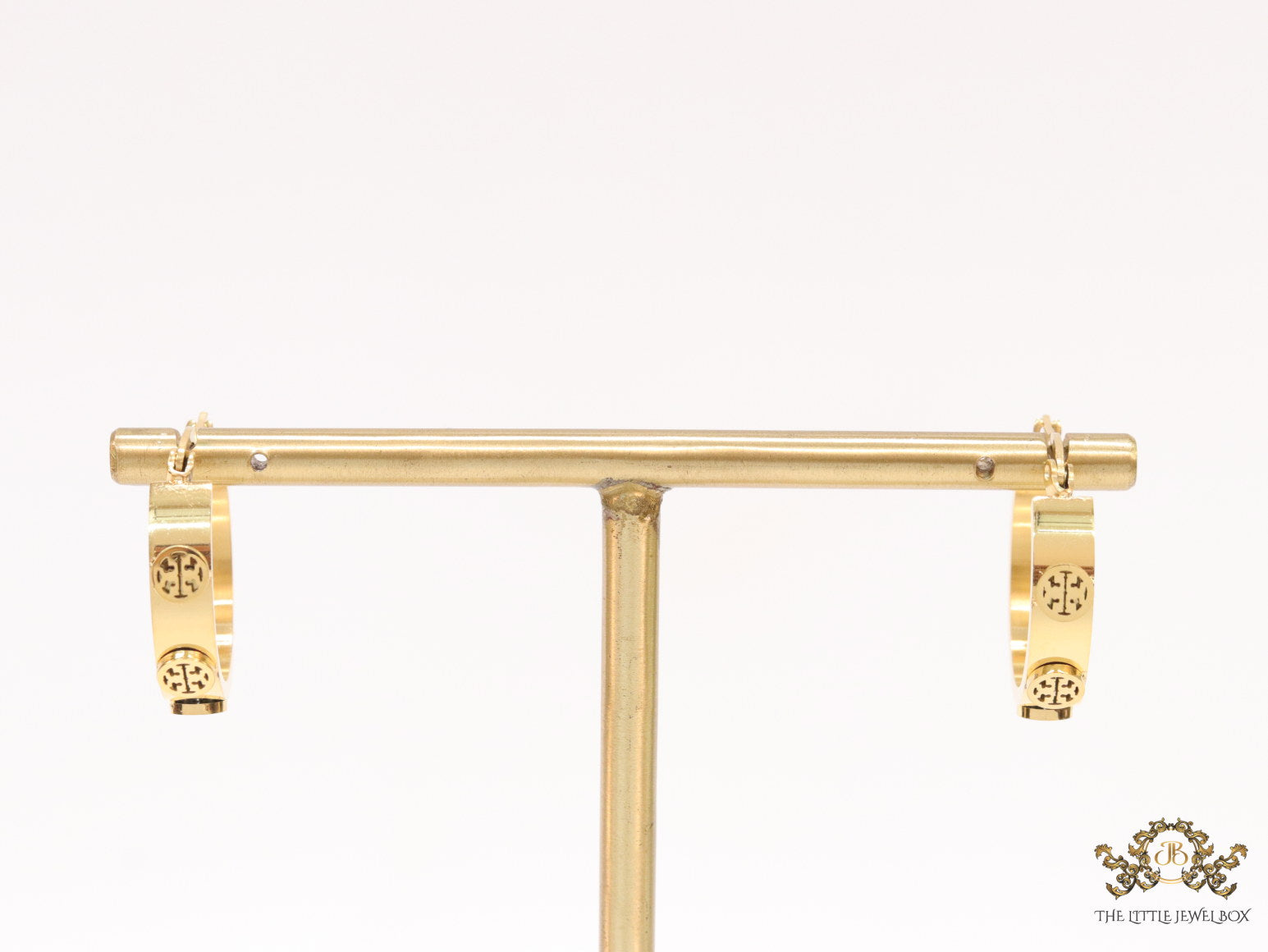 Gold plated hoop earrings with double T motifs