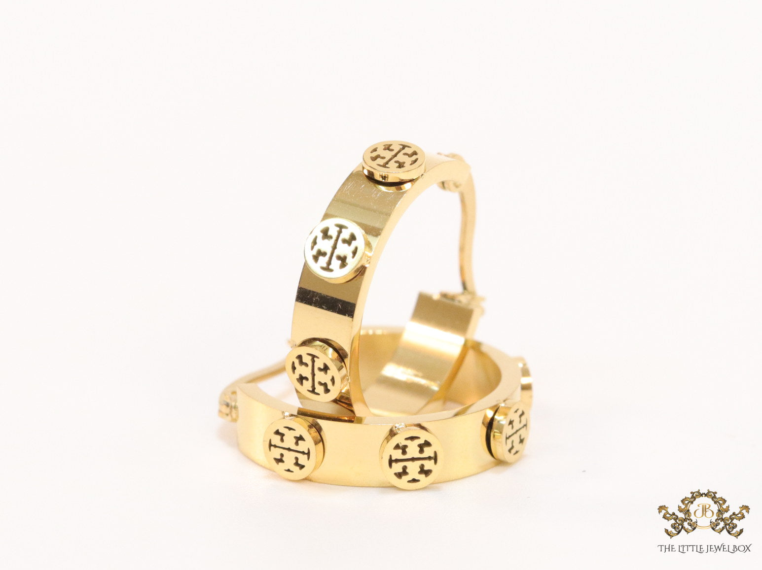 Gold plated hoop earrings with double T motifs