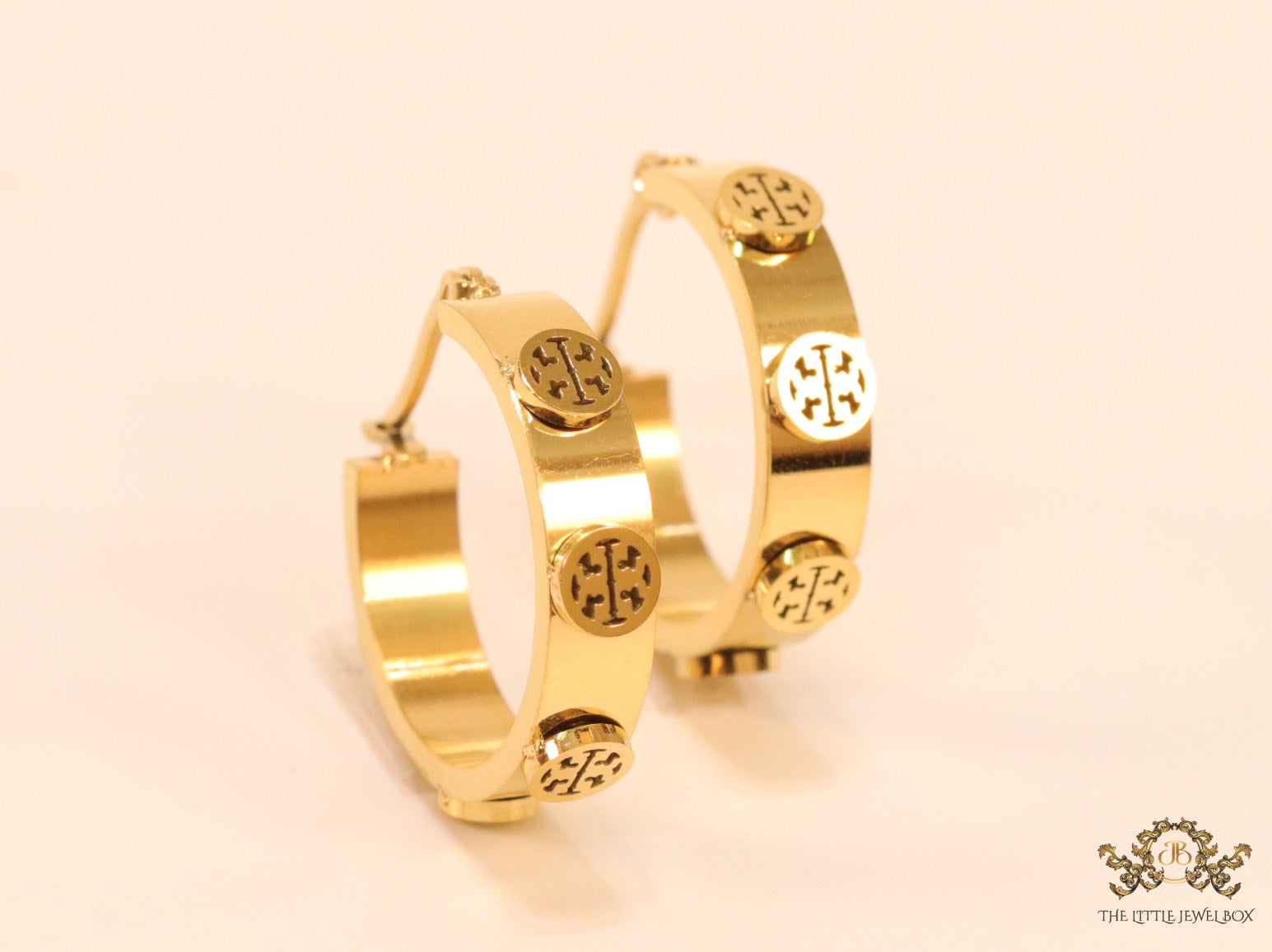 Gold plated hoop earrings with double T motifs