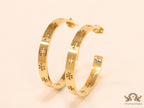 Gold plated hoop earrings with double T motifs 38 mm