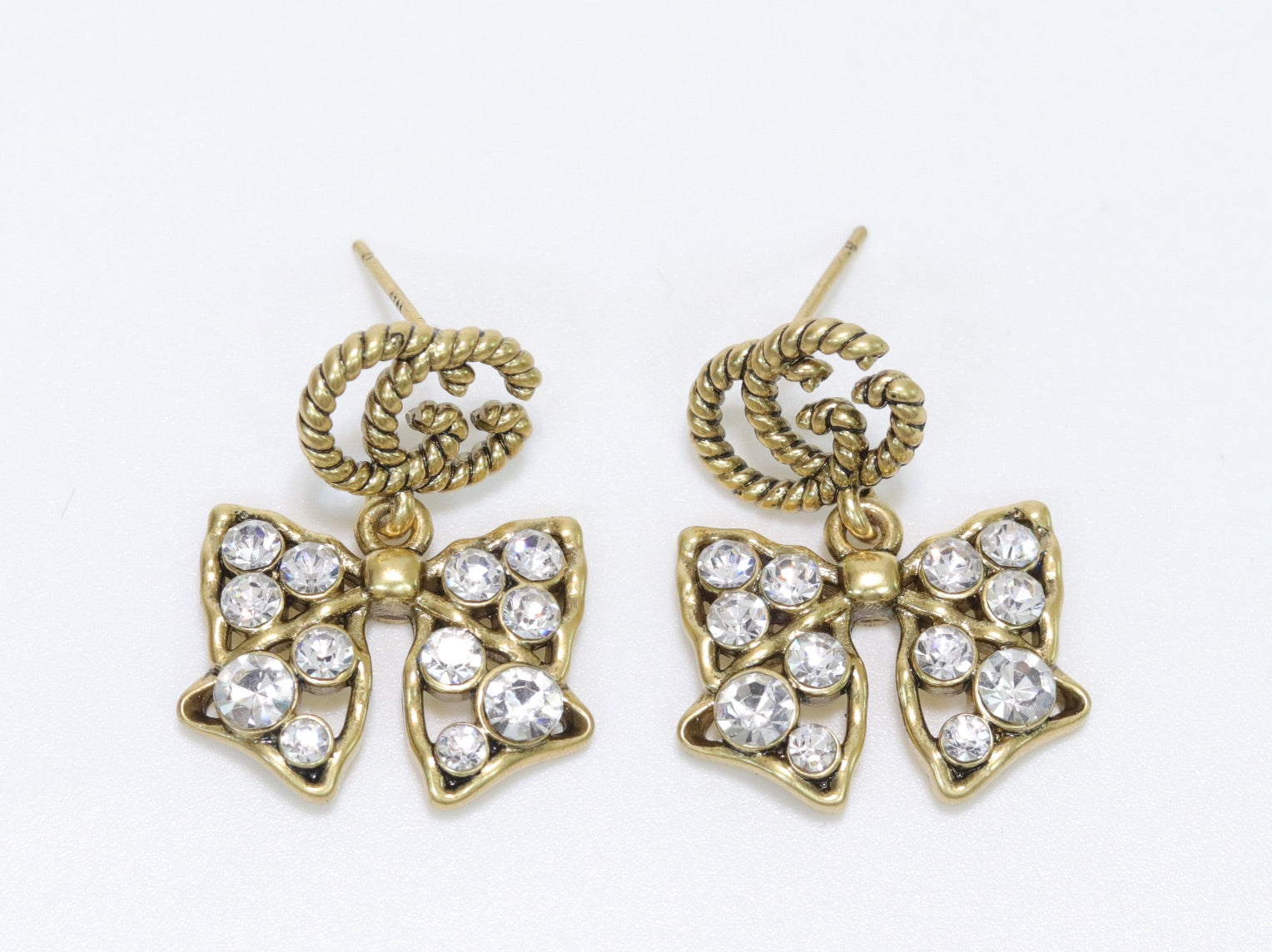 Double G rustic bow dangles with CZ