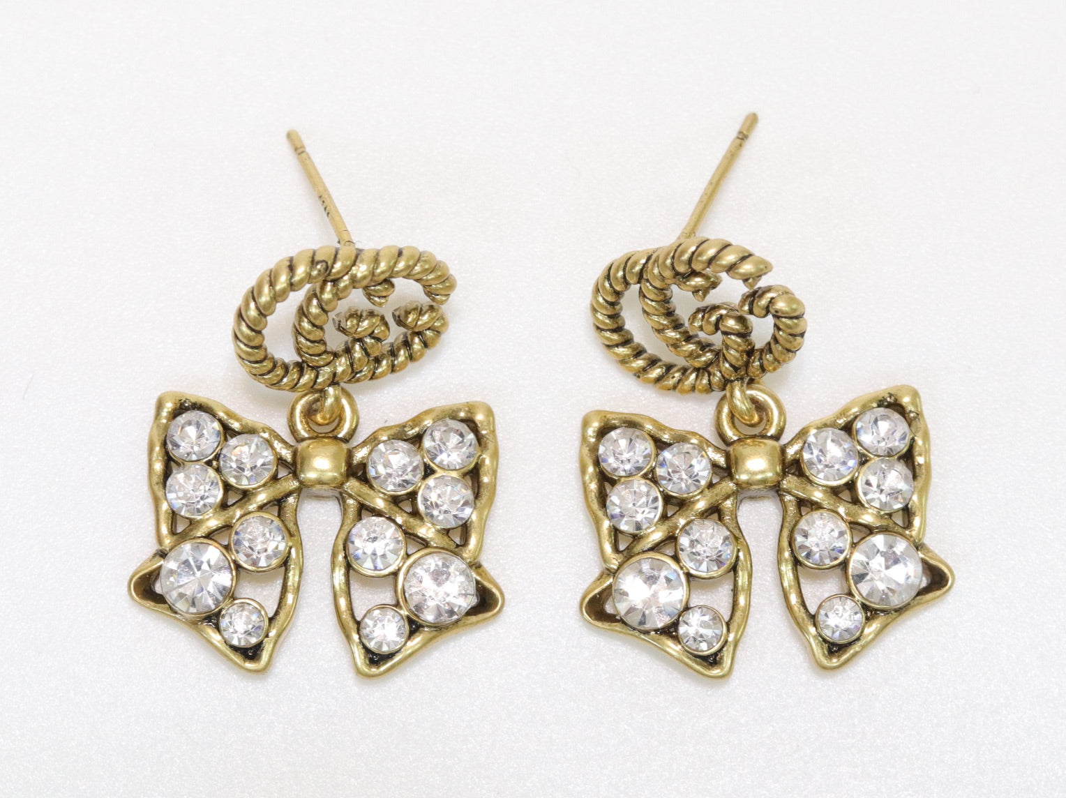 Double G rustic bow dangles with CZ