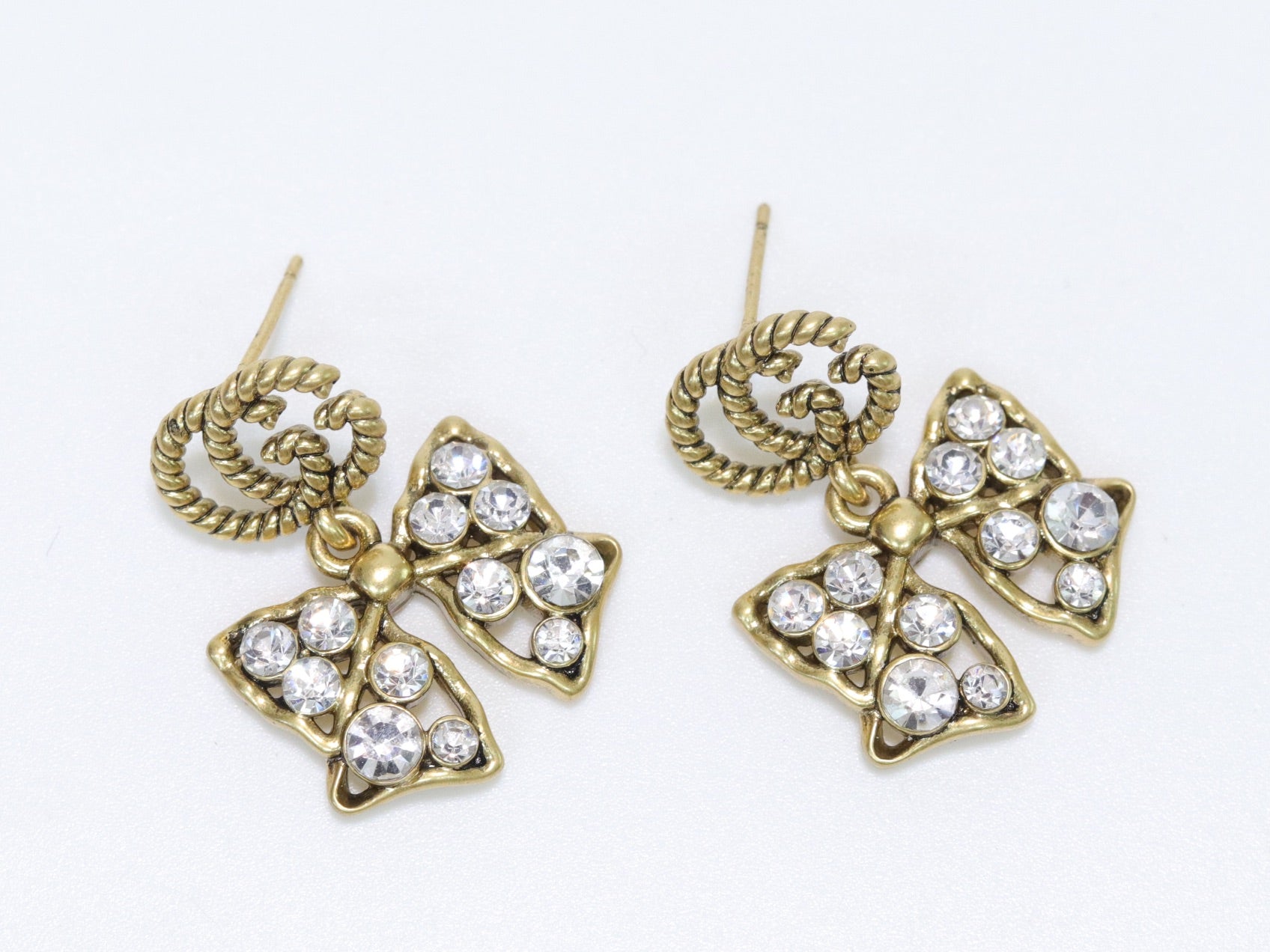 Double G rustic bow dangles with CZ