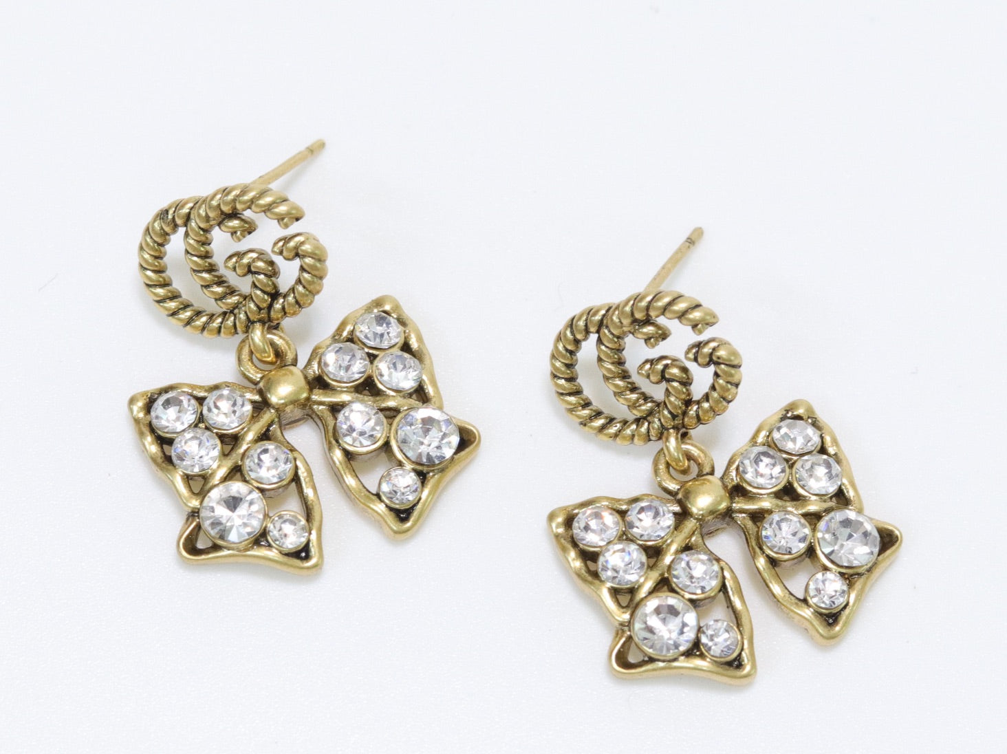 Double G rustic bow dangles with CZ
