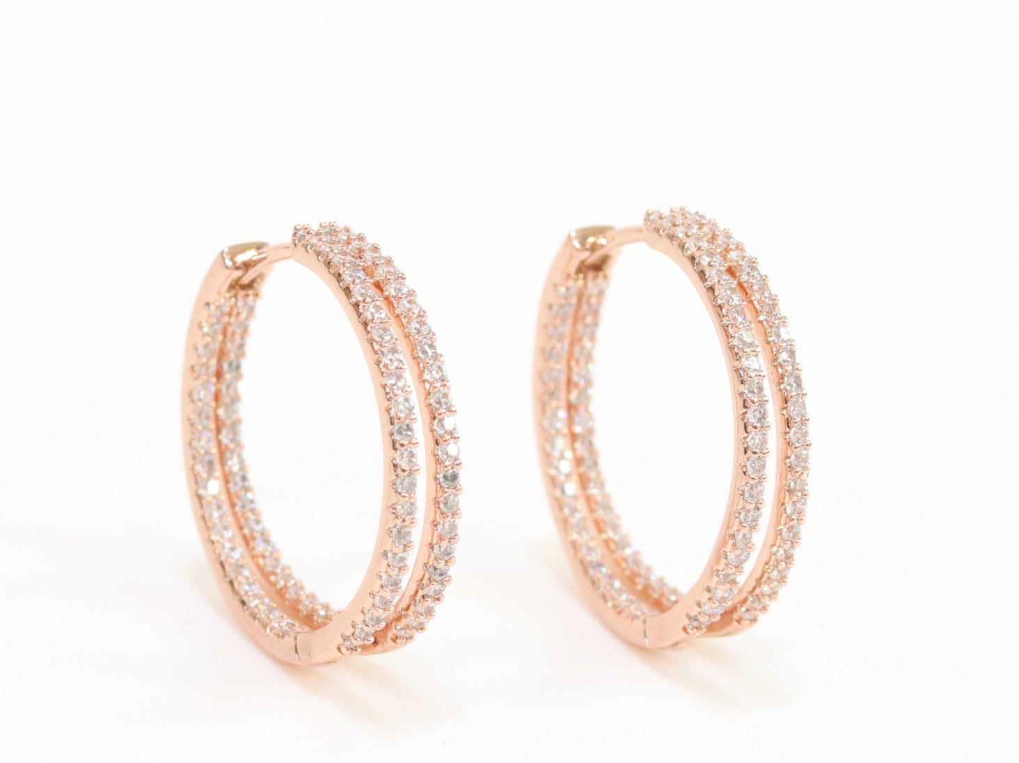 Double layered hoops with CZ in rose gold finish