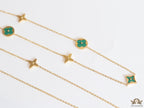 Golden chain necklace with malachite green clovers
