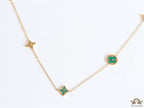 Golden chain necklace with malachite green clovers