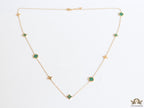 Golden chain necklace with malachite green clovers