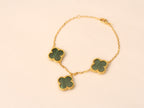 Gold Clover charms bracelet in green