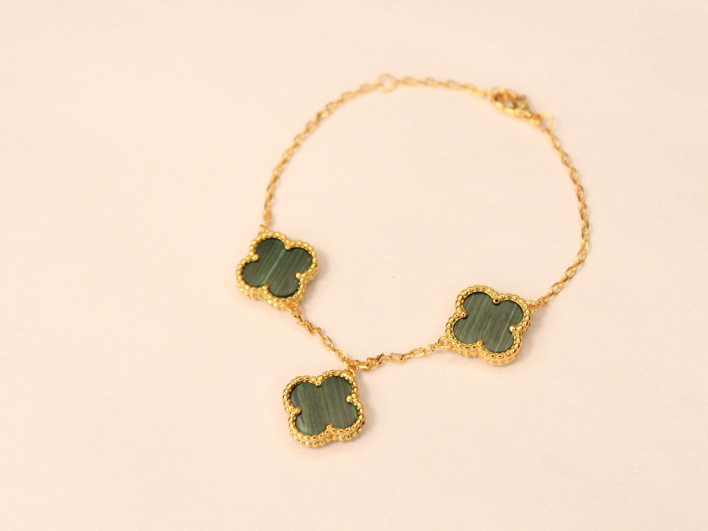 Gold Clover charms bracelet in green