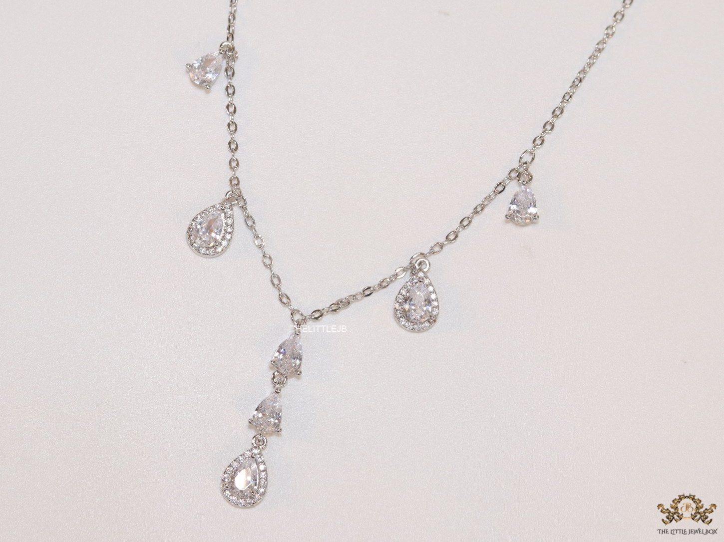 Platinum plated cz drop necklace