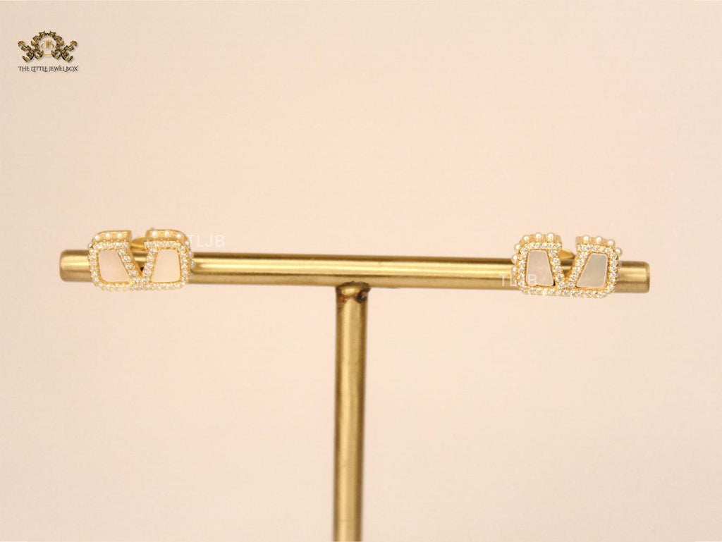 Alphabet V white mop earrings