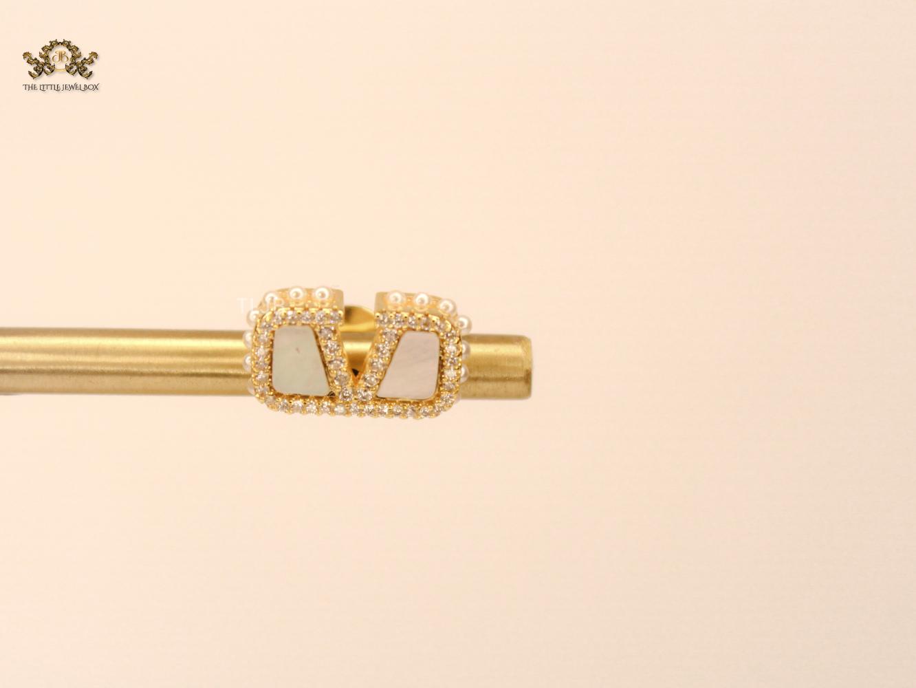 Alphabet V white mop earrings