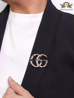 Rustic twin G brooch with multi coloured stones