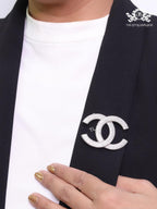 Platinum plated twin C brooch with cz