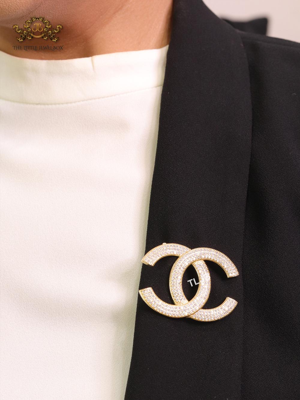 Gold plated twin C brooch with cz