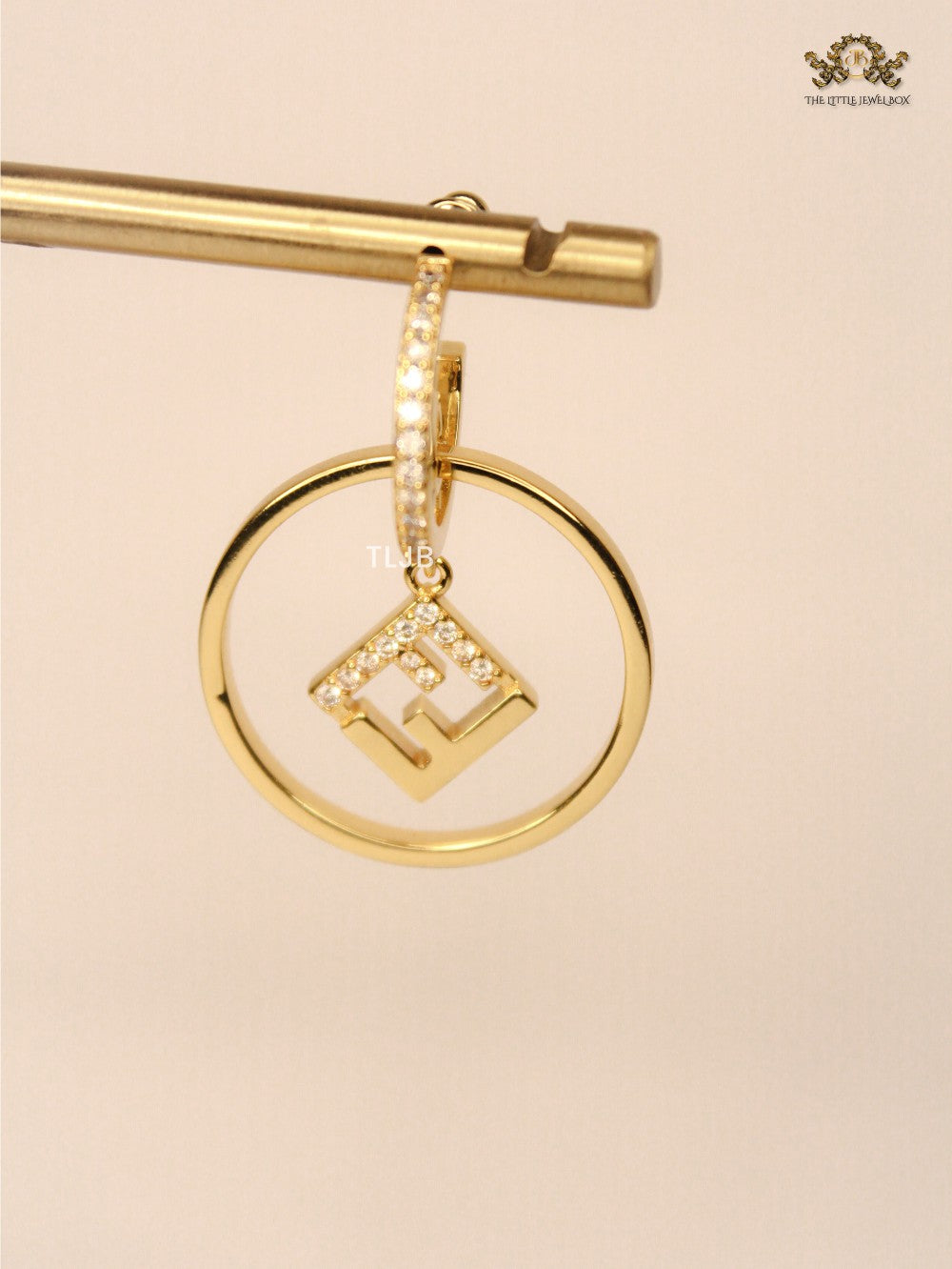 Alphabet F gold and CZ hoop earring