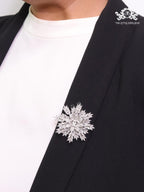 Flower and leaf brooch in platinum finish and cz