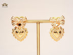 Golden stereo heart earrings