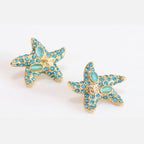 Aqua gold star studs