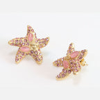 Pink gold star studs