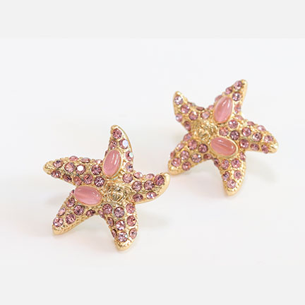 Pink gold star studs