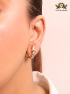 Rose gold and cz serpentine studs