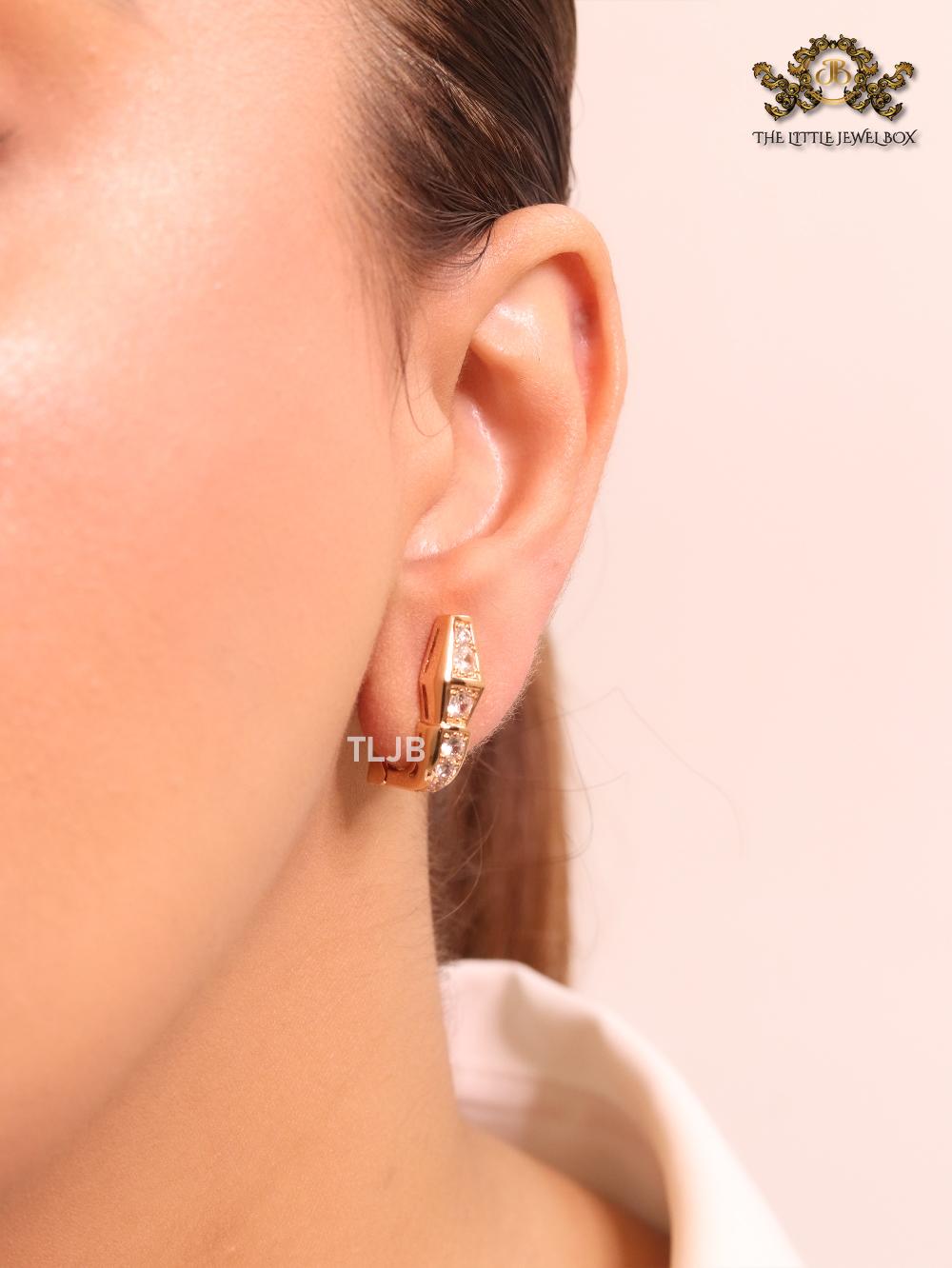 Rose gold and cz snake studs