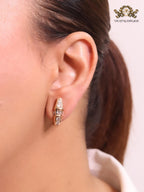 Rose gold and cz snake studs
