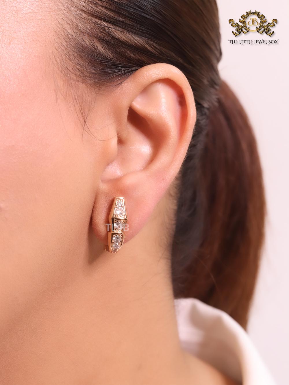 Rose gold and cz snake studs