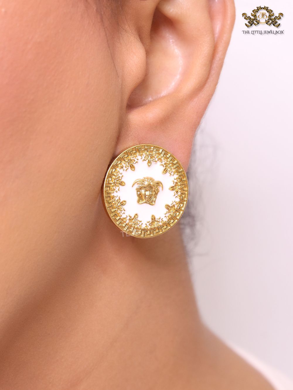 Medusa gold and white studs