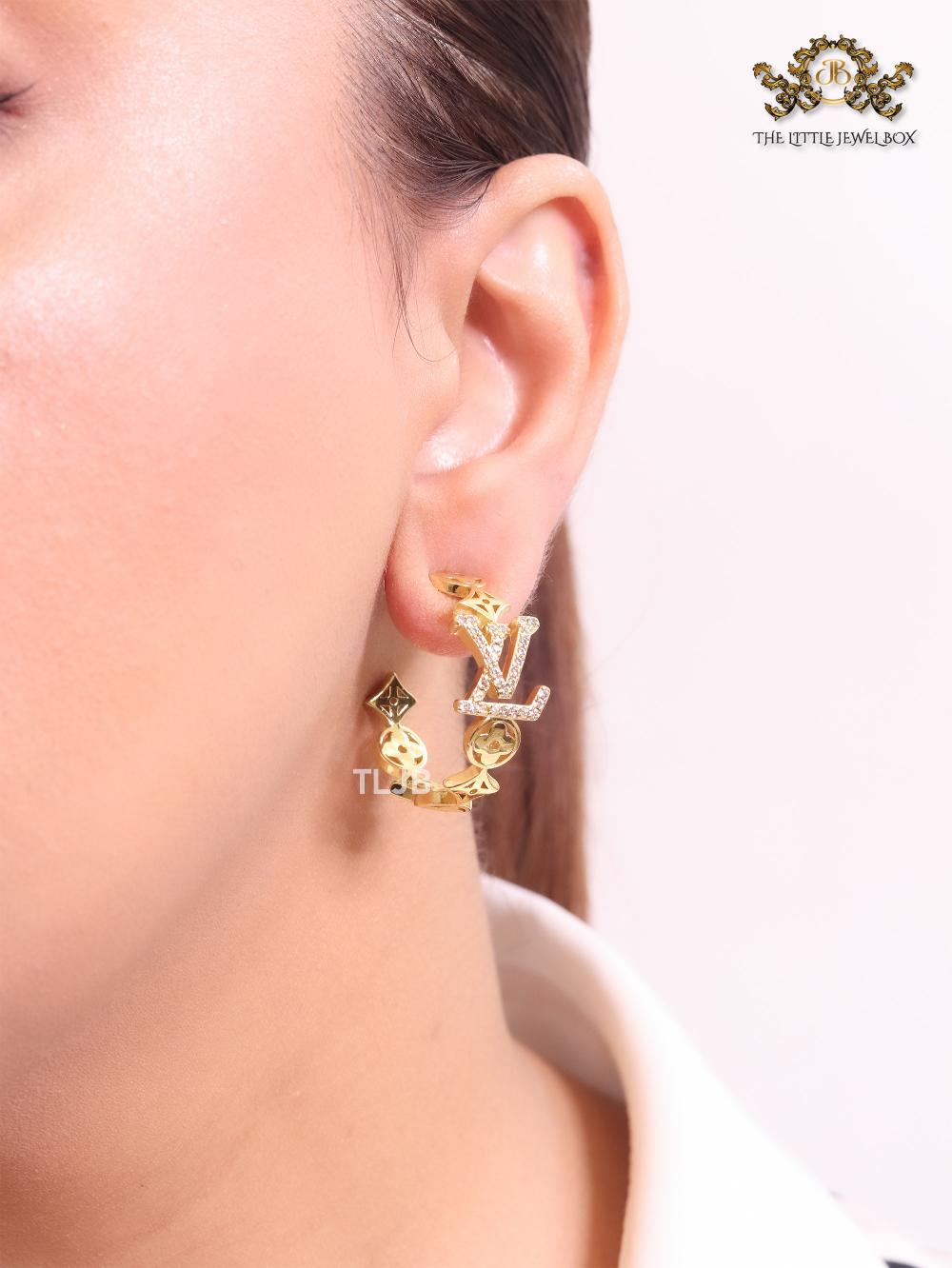 Alphabet L & V gold and cz statement hoops
